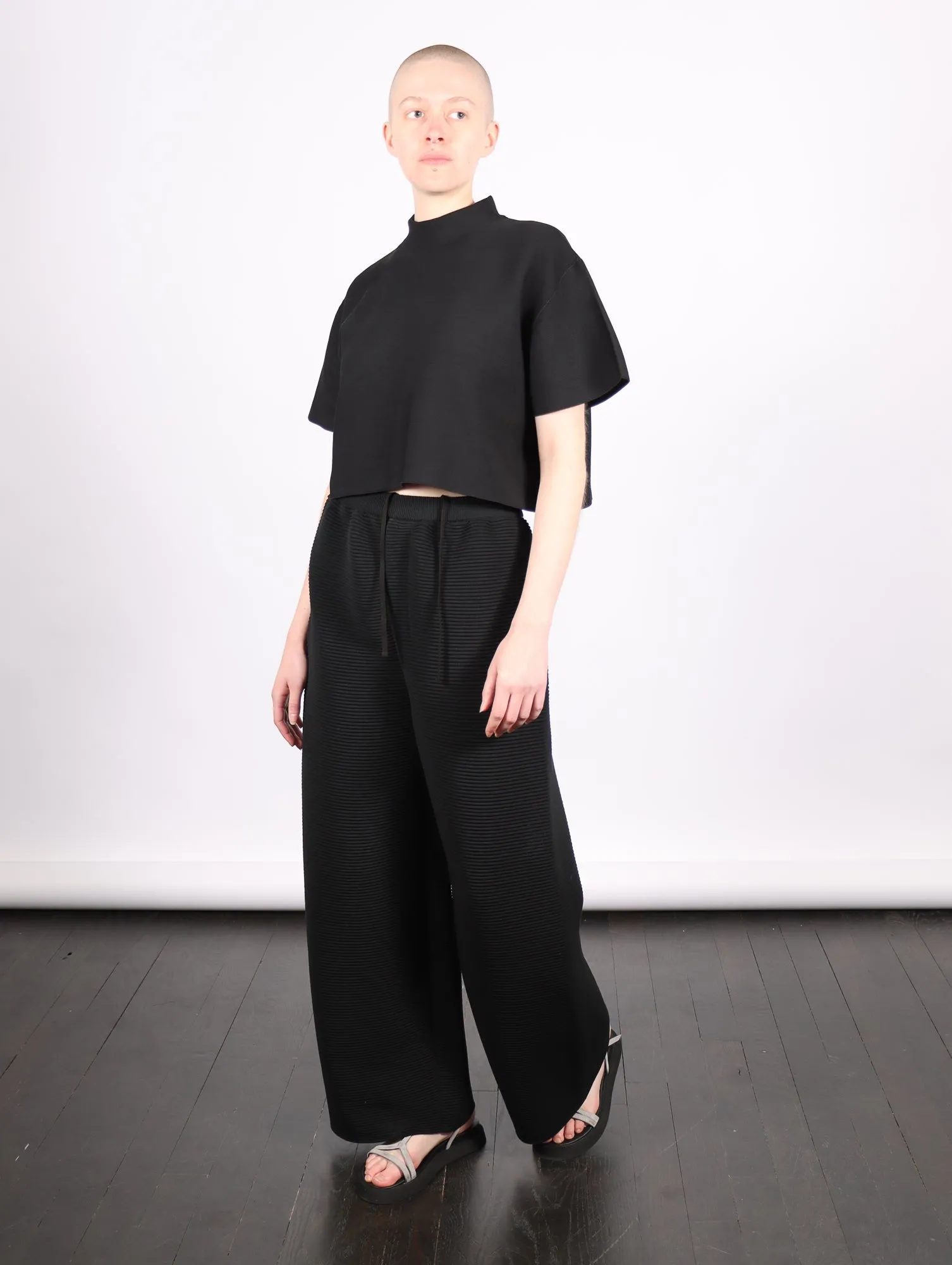 Stratum Wide Straight Pants in Black by CFCL